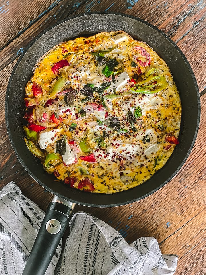 Breakfast Fritatta with peppers, onions, feta, tomatoes and basil