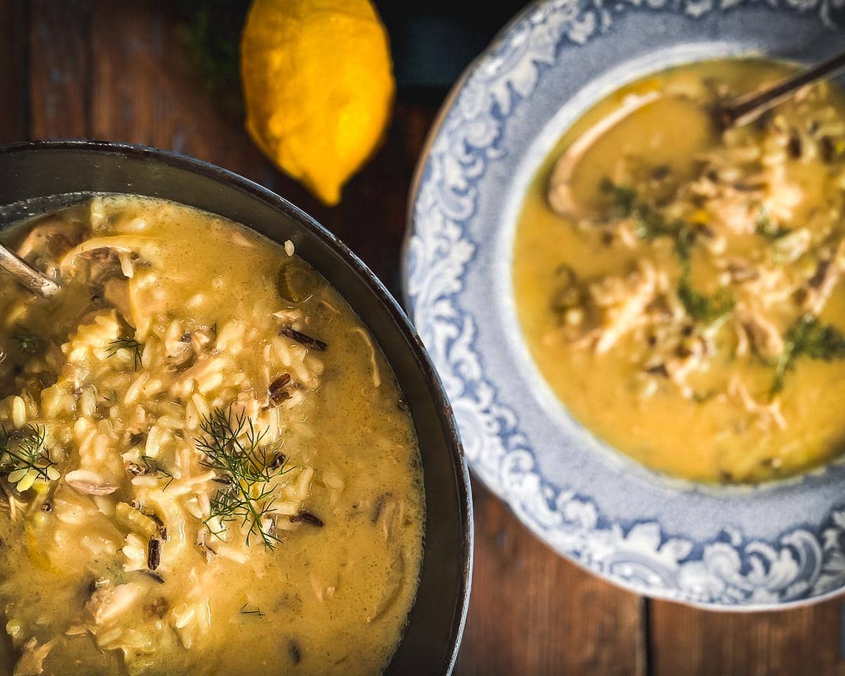 Close up view of Greek Lemon Chicken Soup in a casserole.