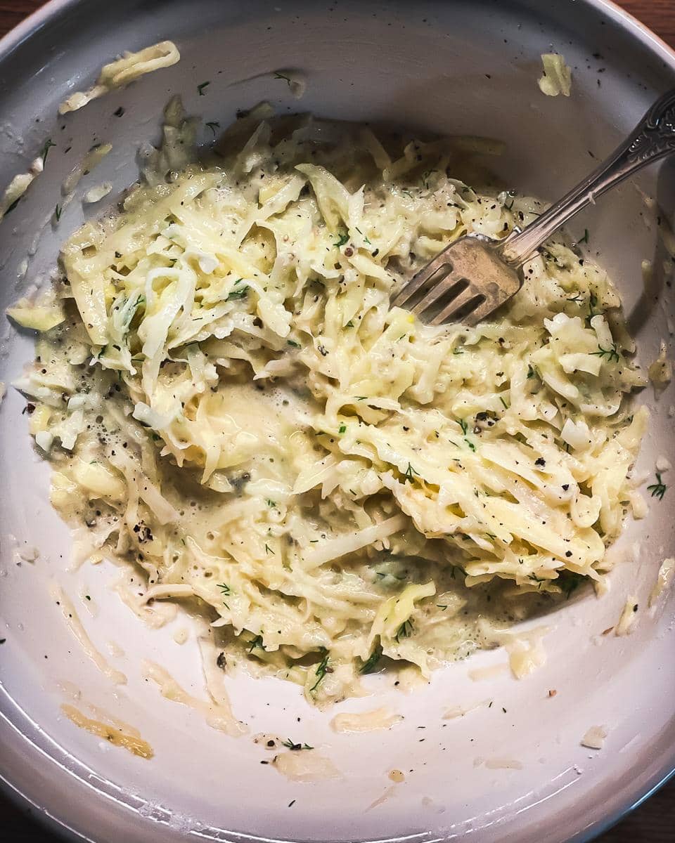 Grated onion and potato mixture ready for frying to make potato deruni.