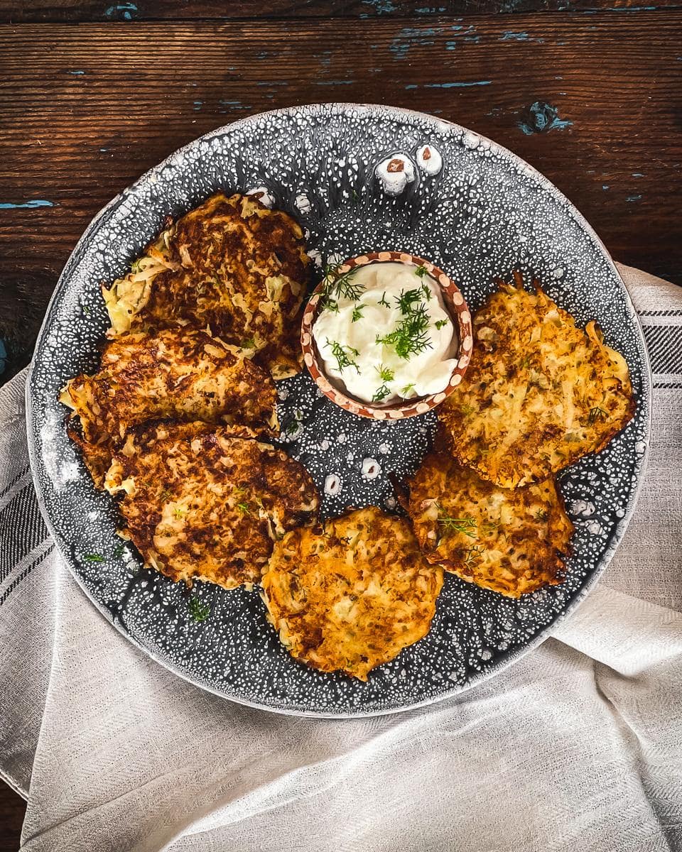 Ukrainian potato deruni (pancakes) served with sour cream.