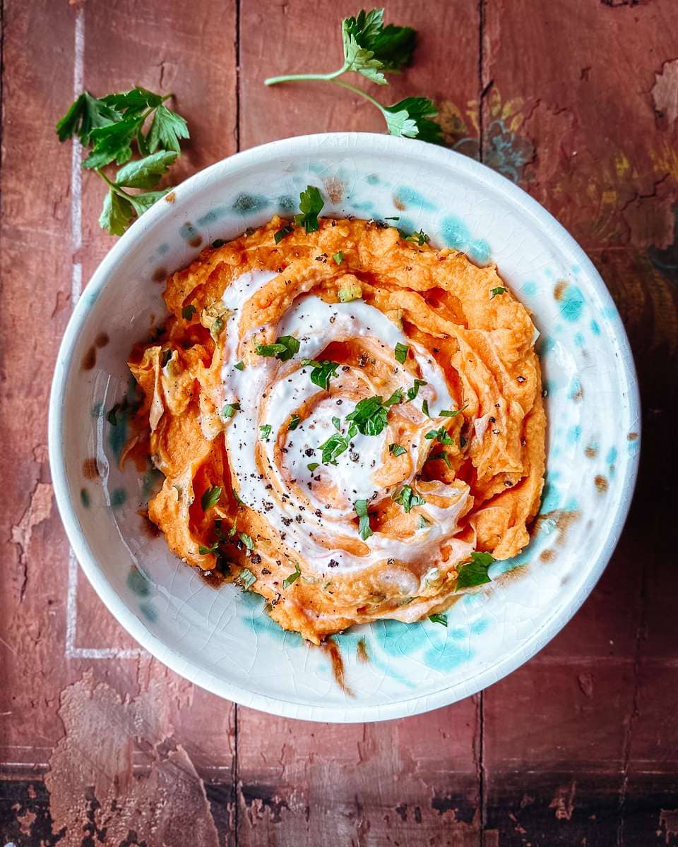 Sweet potato puree with saffron butter, spring onions and yoghurt