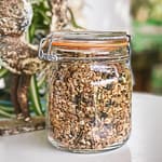 Healthy homemade granola stored in a Kilner jar.