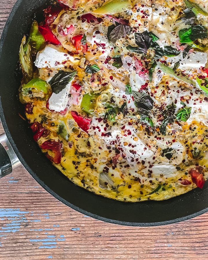 Breakfast Fritatta, Greek style with tomatoes, feta, onions and peppers.