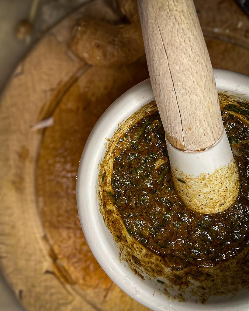 Chermoula paste ground in a pestle and mortar