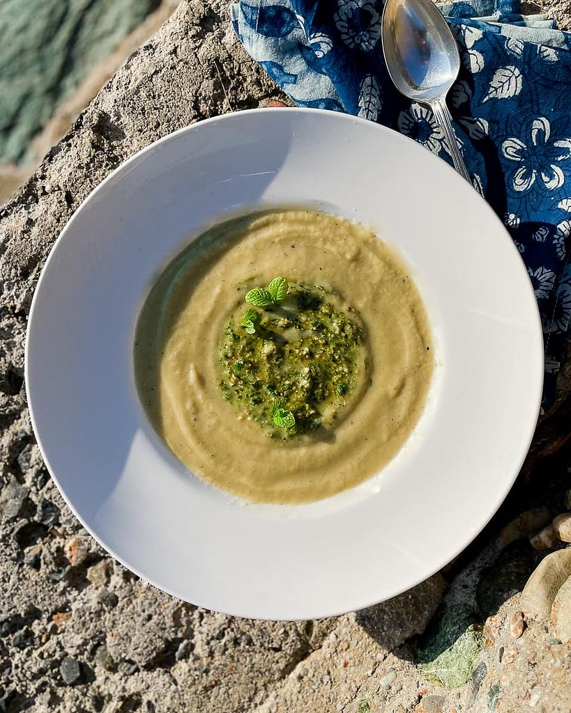 Pear and celeriac soup garnished with a fresh mint pesto.