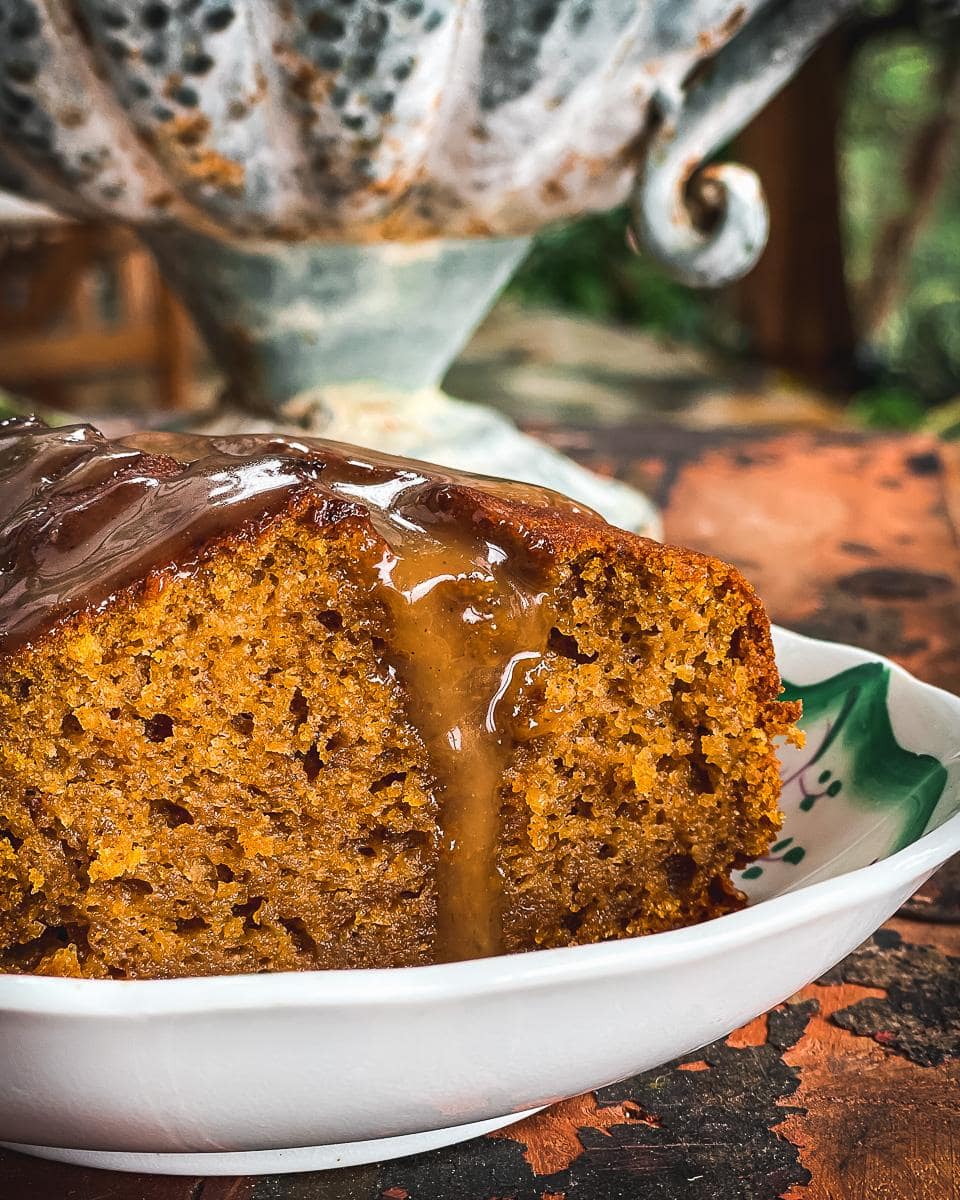 Pumpkin cake drizzled with salted caramel sauce.